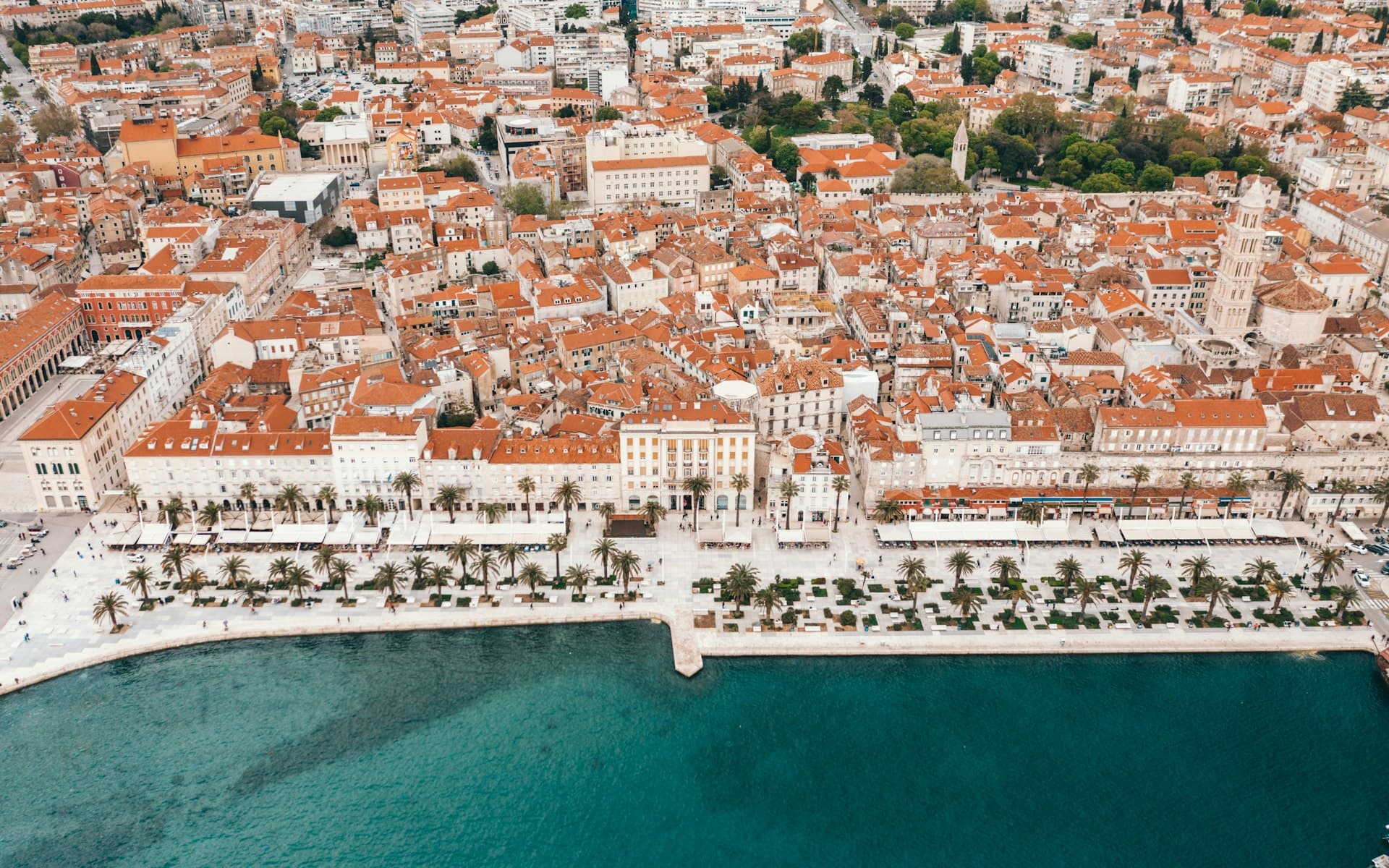 Aerial view of Split's Riva promenade, Diocletian's Palace, and turquoise Adriatic Sea